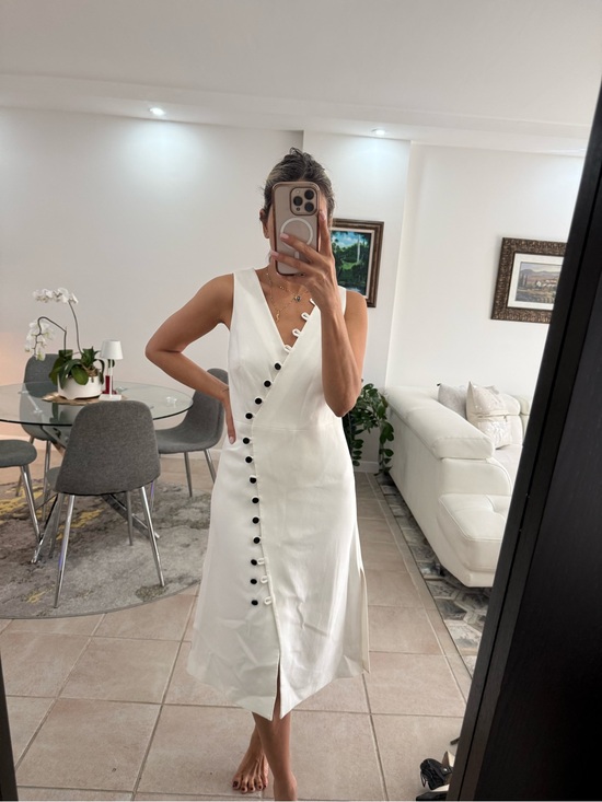 Alexis Dresses & Skirts - Alexis White Sleeveless V-Neck Midi Dress with Black Buttons
